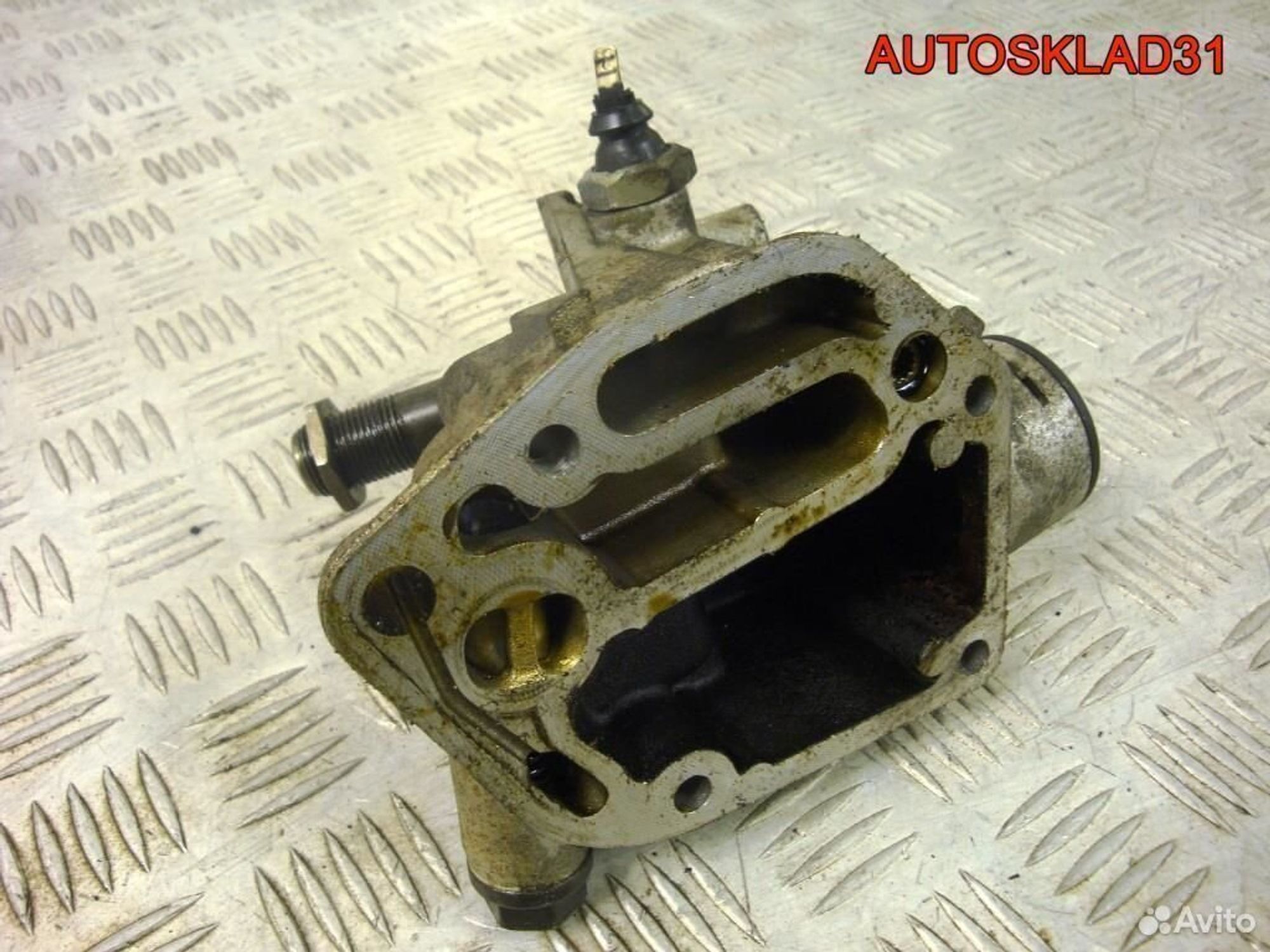 Кронштейн масляного фильтра VW Passat B5 06A115417, 1300 рублей, Дубовое